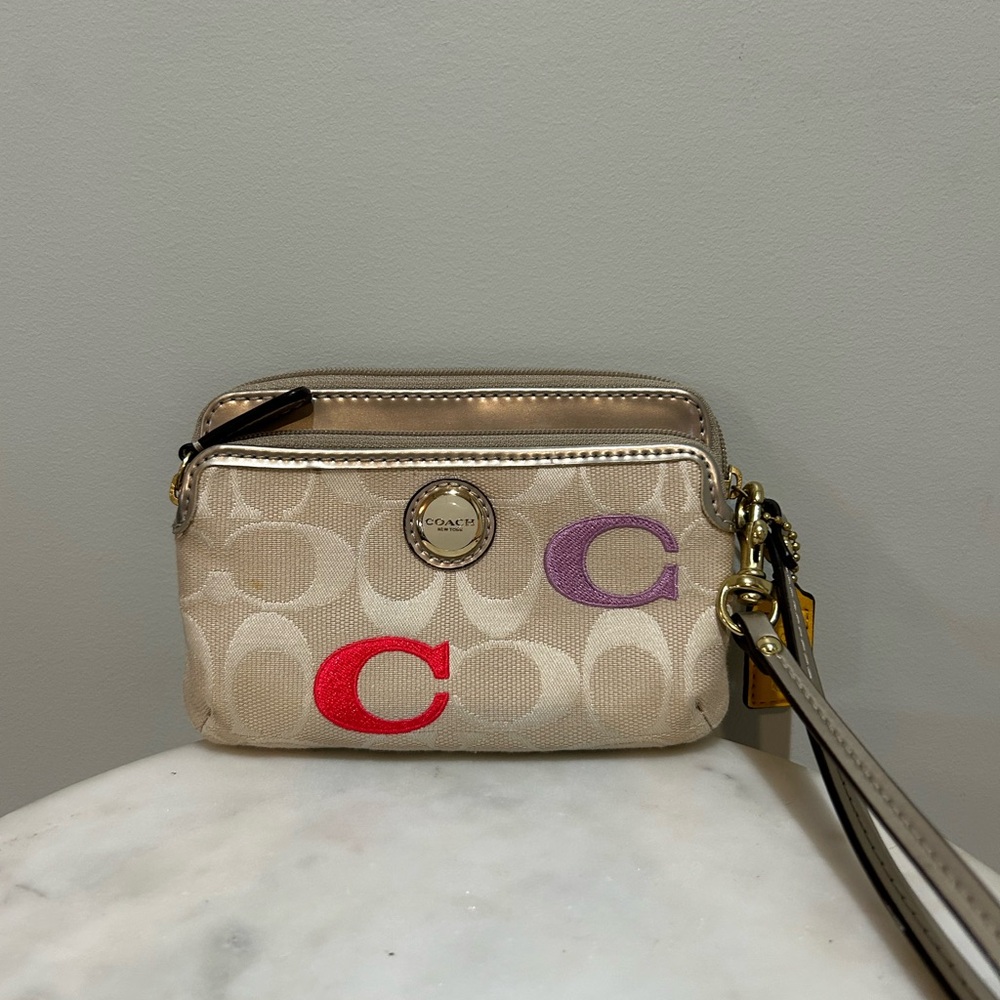 Coach Beige Signature Canvas Wristlet with Red & Purple C Accent